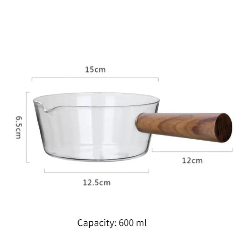 Transparenter Kochtopf aus Glas mit Holzgriff